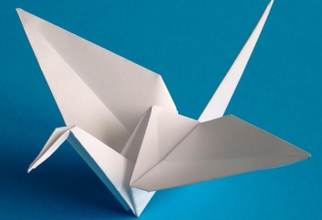 Hoe zwanen uit papier te maken