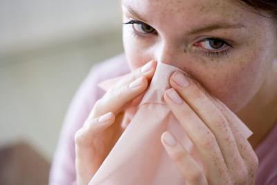 Groene snot bij een volwassene: de oorzaken en gevolgen